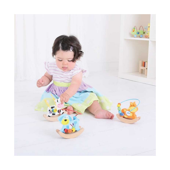 Bigjigs Baby Motorický labyrint houpačka kravička