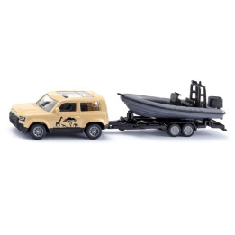 SIKU Blister 1126 - Land Rover Defender Safari s člunem