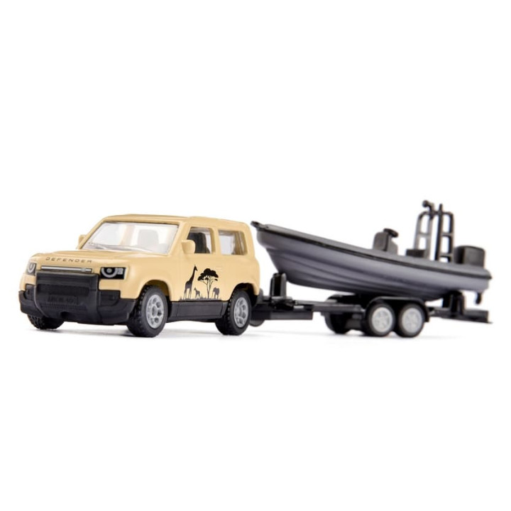 SIKU Blister 1126 - Land Rover Defender Safari s člunem