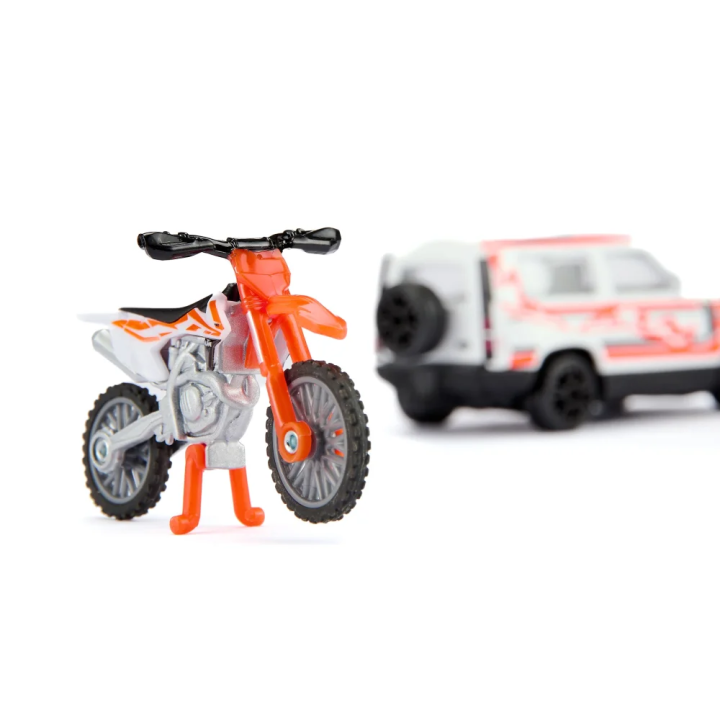SIKU Blister - Land Rover Defender s motocyklem KTM 450 SX-F