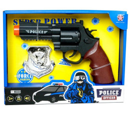 Policejní pistole s odznakem